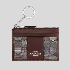 Coach Bags COACH Mini Id Skinny In Signature Jacquard Oak/Maple CU988